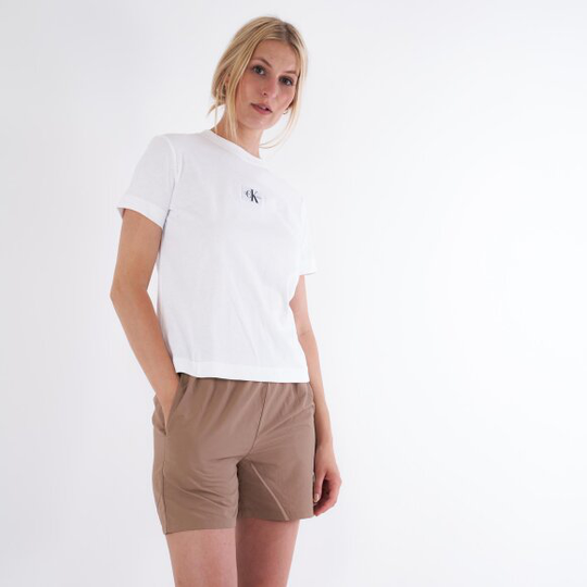 Badge seaming tee