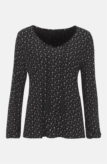 Småmønstret jerseybluse med lange ærmer